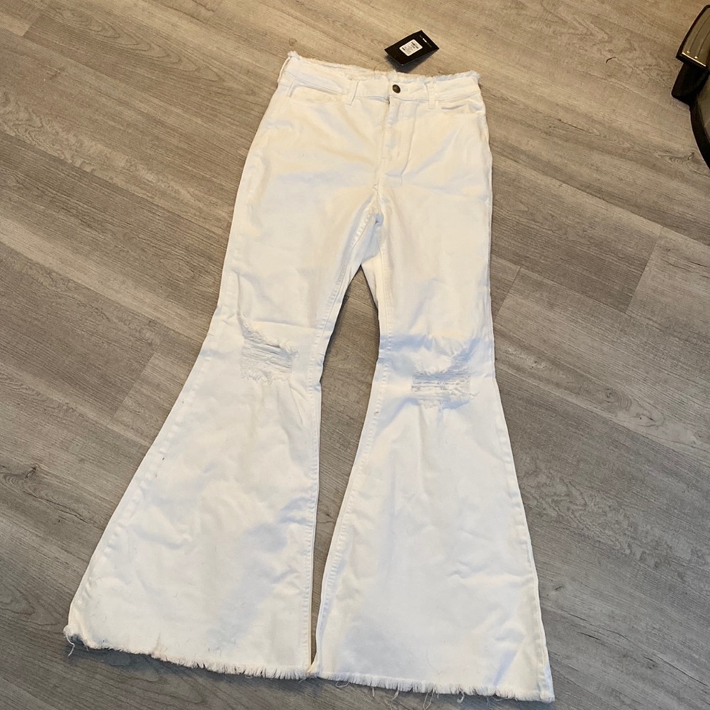 White flare jeans